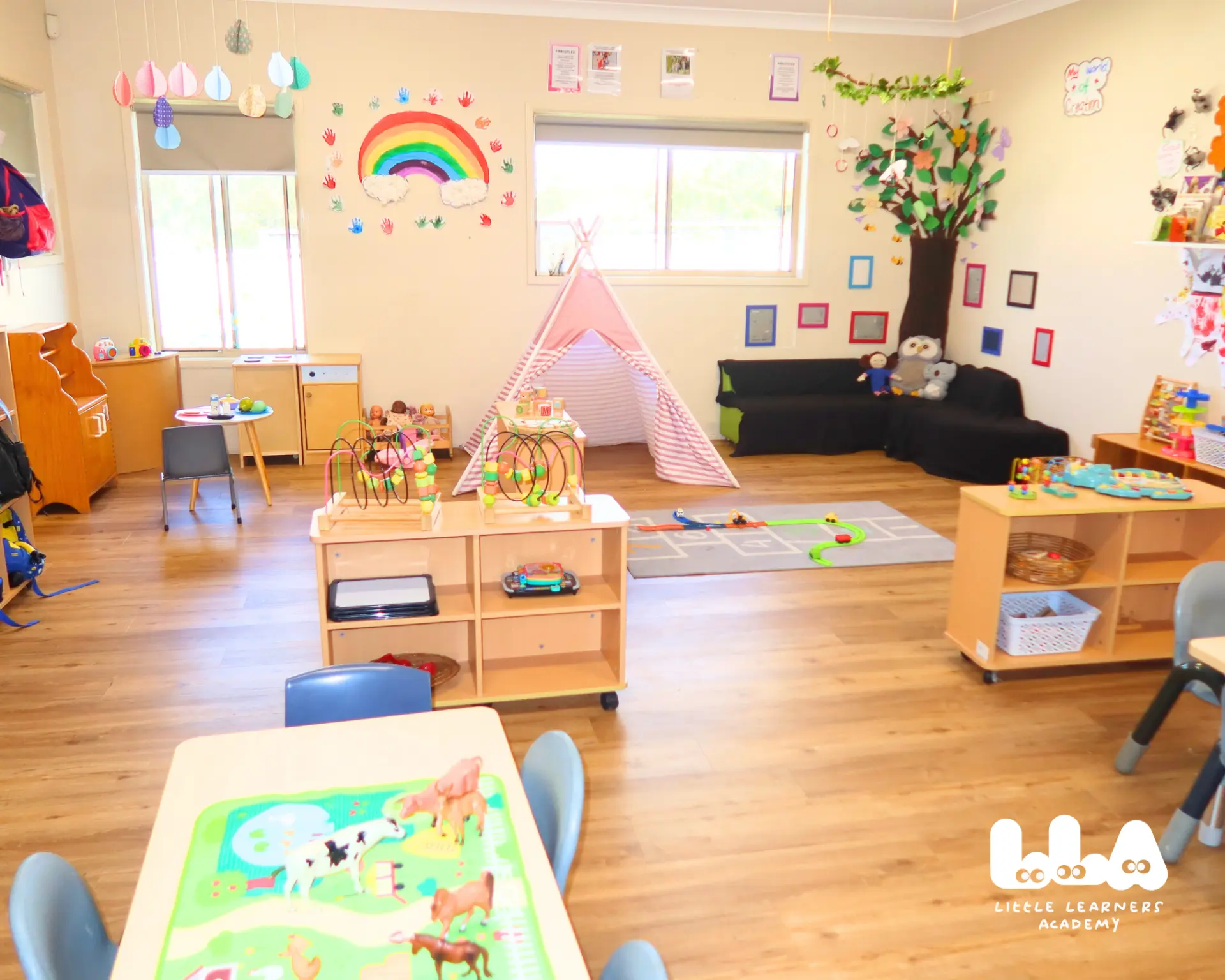 Playroom with teepee, bead mazes and reading corner
